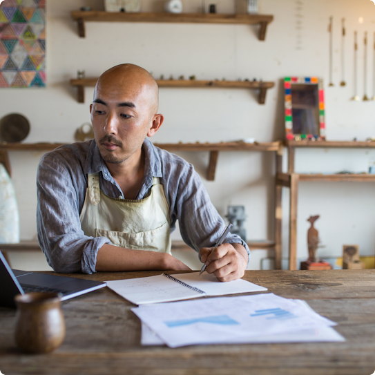 asian american working at computer